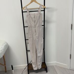 Elegant Cream Jumpsuit from Hollister with adjustable straps